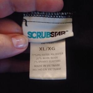 Black scrub pants. Xl. Pink ribbon.